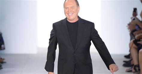 does michael kors own versace|Michael Kors acquisition.